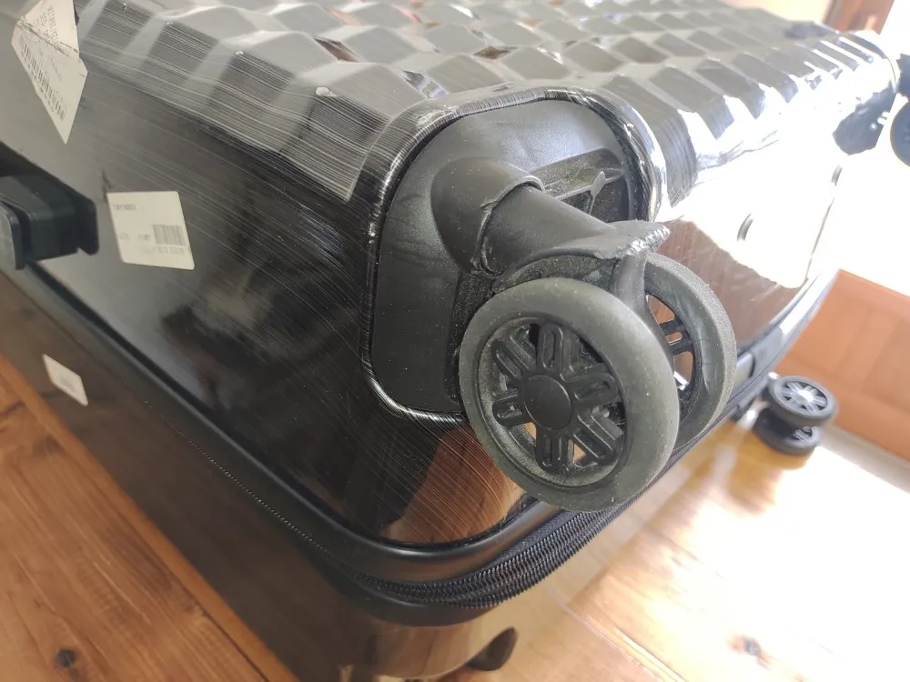 スーツケースのダブルキャスターの車軸がグラグラする